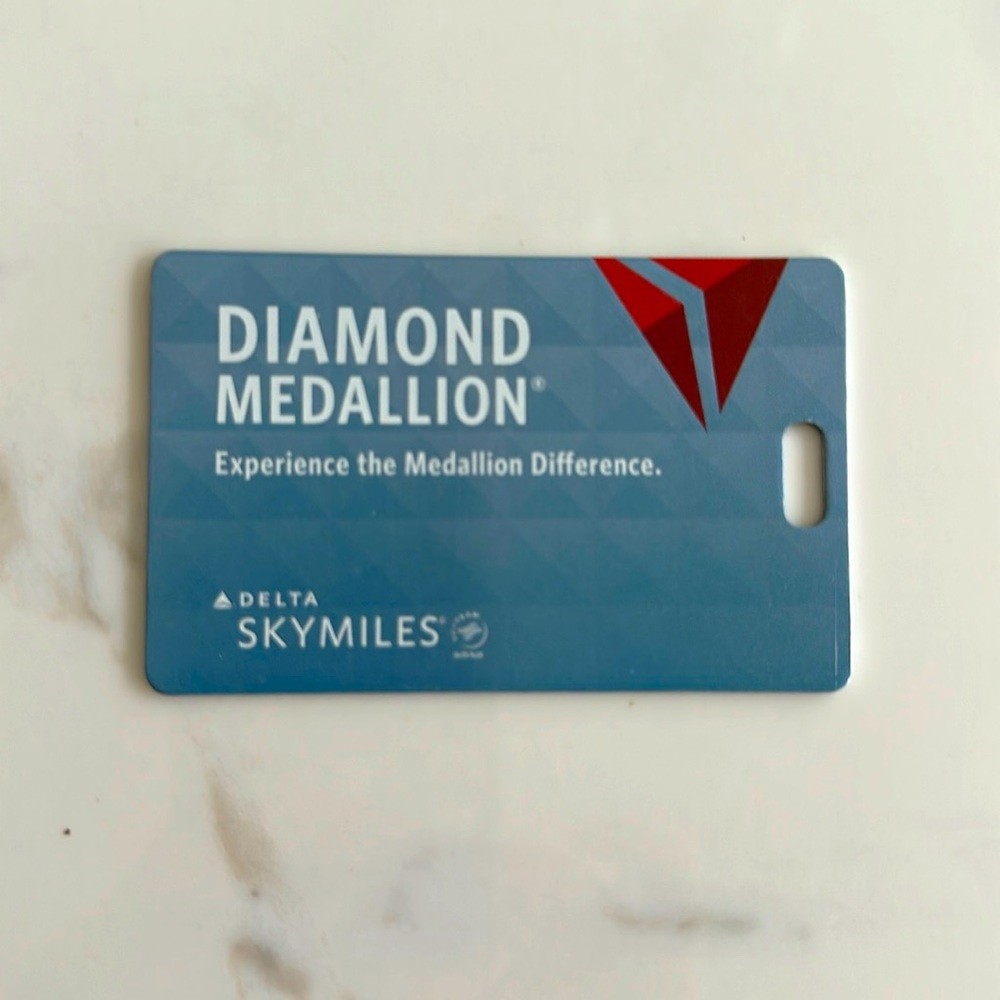 Delta Diamond Medallion tag
